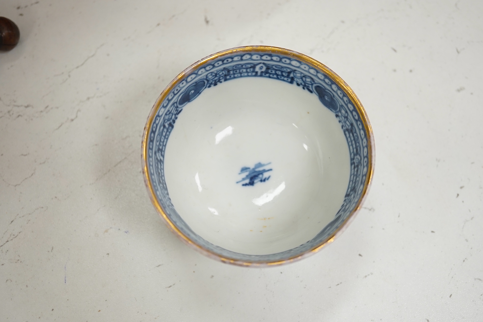 A Chinese blue and white plate, a tea bowl, two pottery bowls and a wooden stand (5). Condition - fair to good.